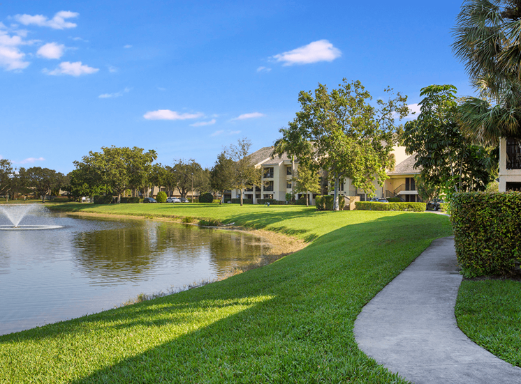 Village Crossing apartments with a lake view in West Palm Beach, Florida