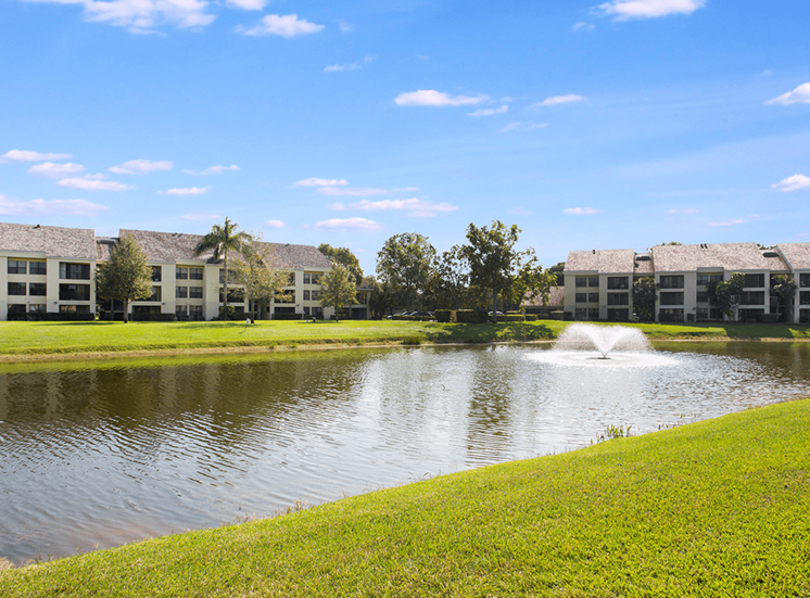 Village Crossing apartments with a lake view in West Palm Beach, Florida