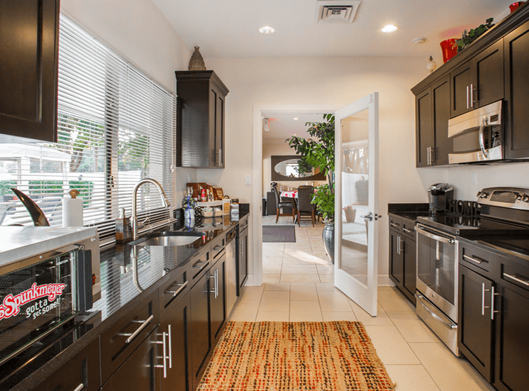 Village Crossing apartments resident community kitchen in West Palm Beach, Florida