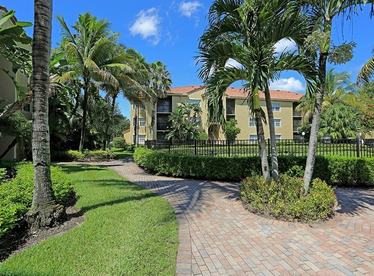 Woodbine apartments tropical landscaping in Riviera Beach, Florida