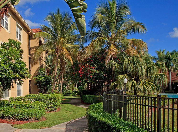 Woodbine apartments tropical landscaping in Riviera Beach, Florida