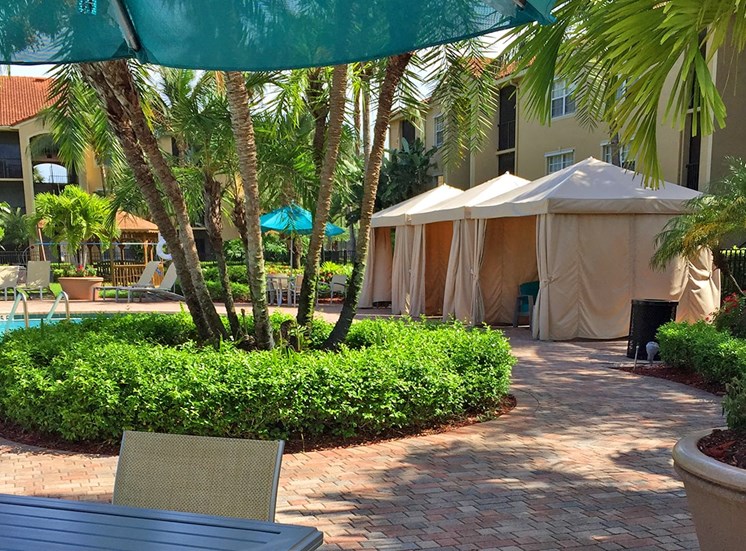 Woodbine apartments poolside cabanas in Riviera Beach, Florida