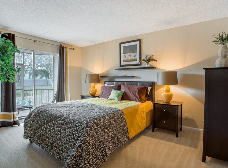 Blue Isle model suite bedroom in Coconut Creek, Florida