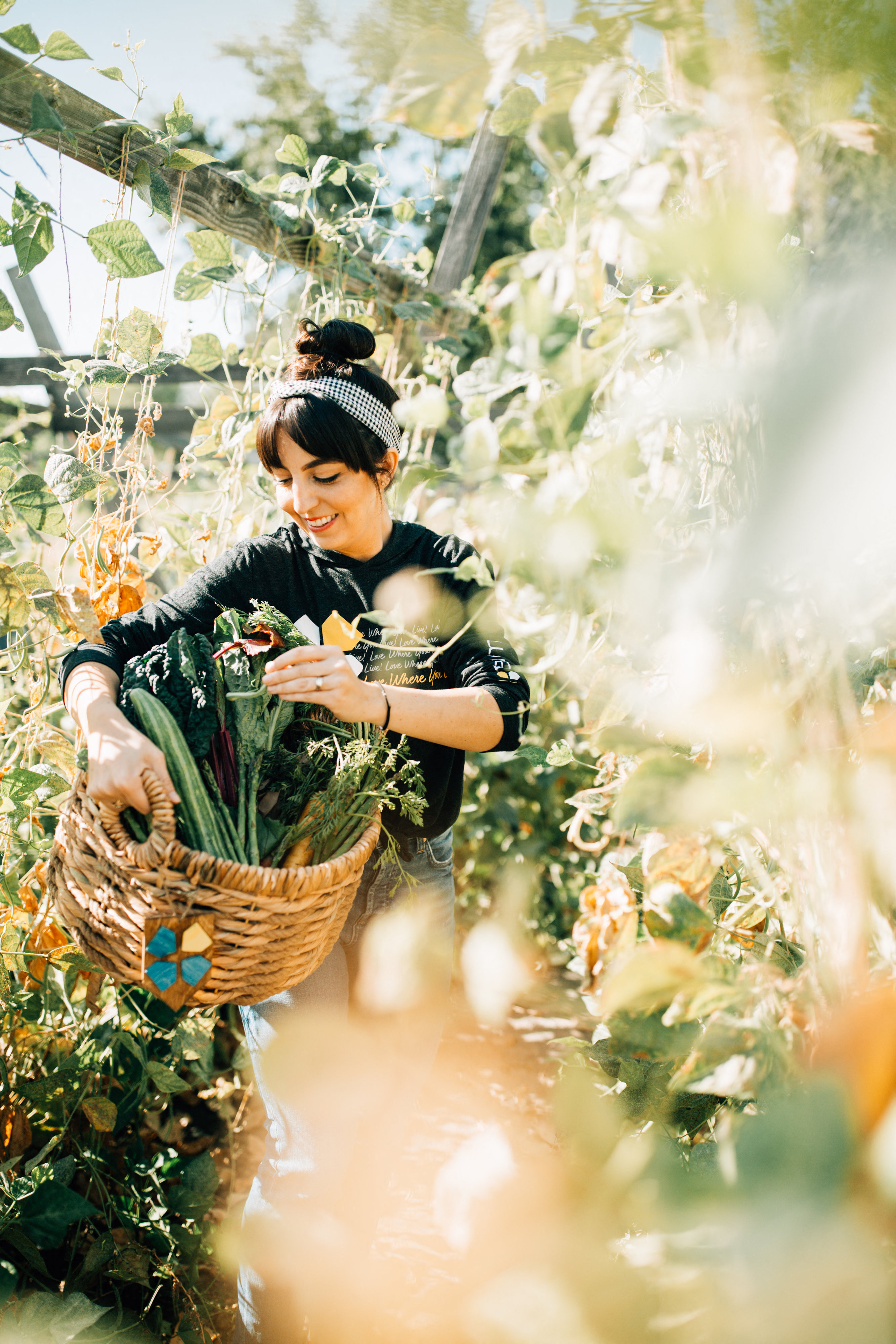 Tandem staff harvesting produce at Tandem Organic Farm