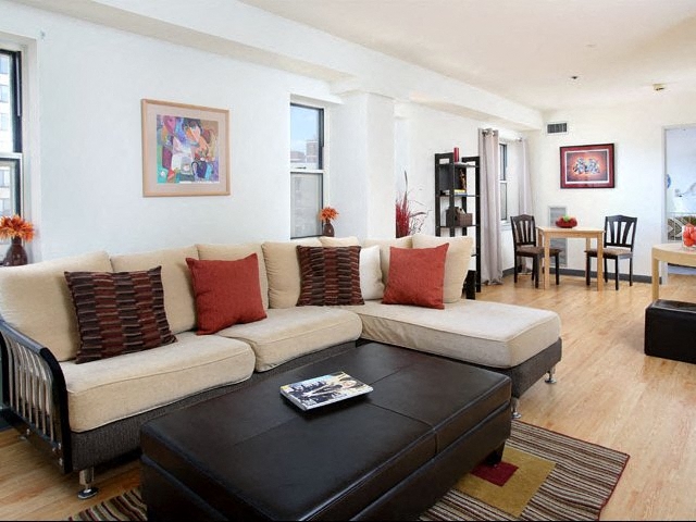 Model apartment setup with open floor plan.