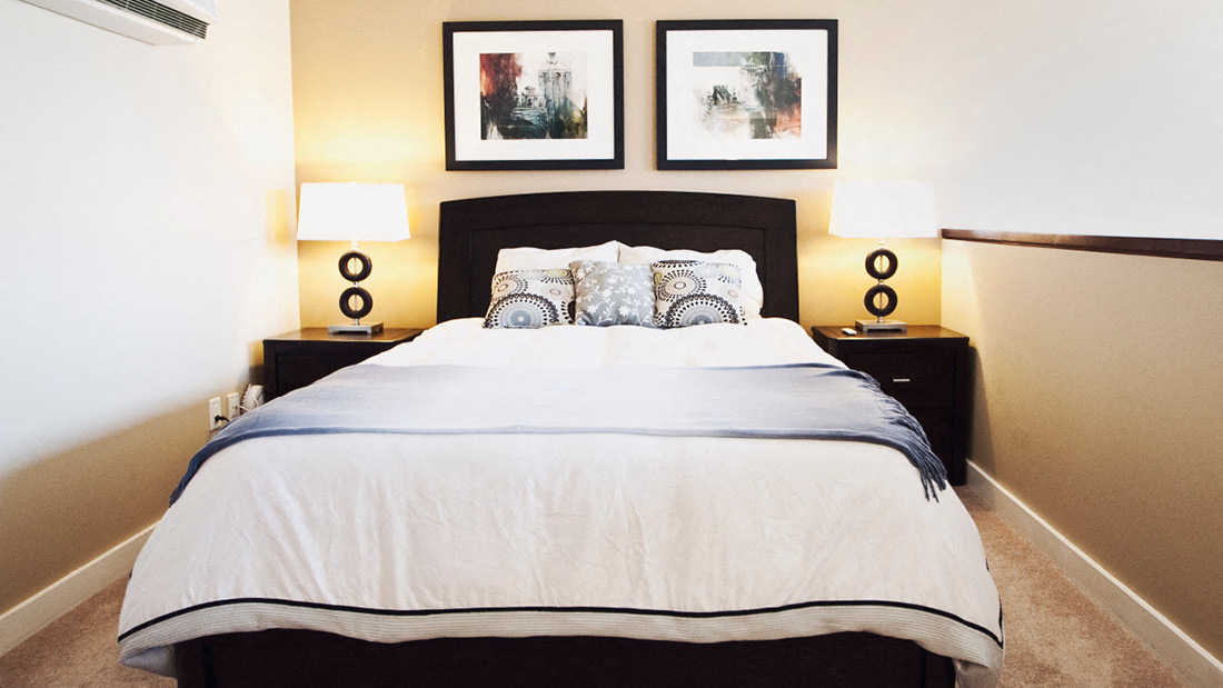Bedroom with Two Night Tables and Wall Art