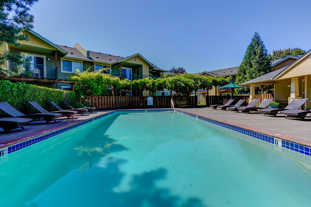 Shimmering pool at Commons at Hawthorn Village Apartments, Hillsboro, OR, 97124