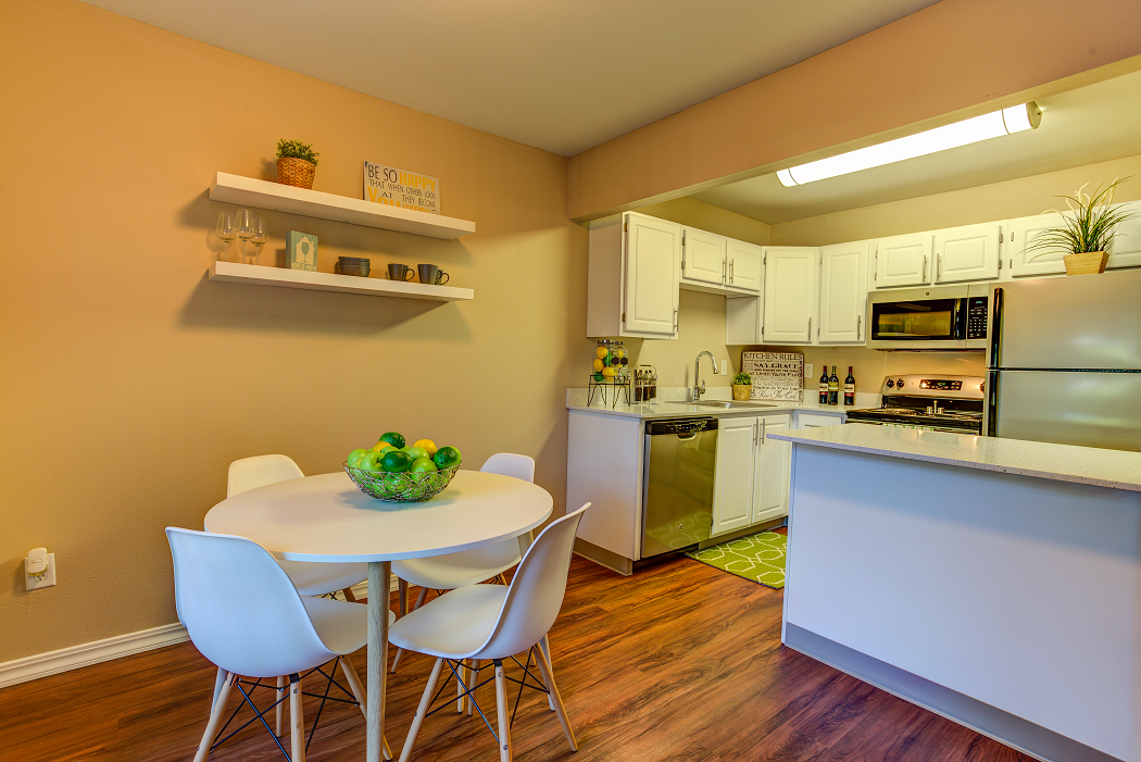 Kitchen and dining at Commons at Hawthorn Village Apartments, Oregon, 97124