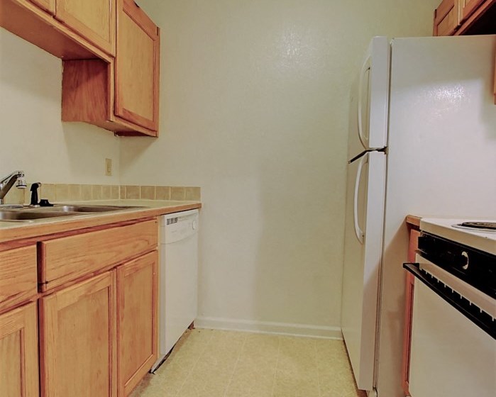 Image of kitchen with cabinets and appliances