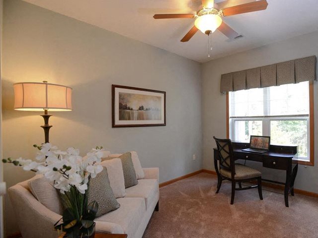 Large Living Rooms With Over Sized Windows at Highlands at Riverwalk Apartments 55+, Wisconsin 53092