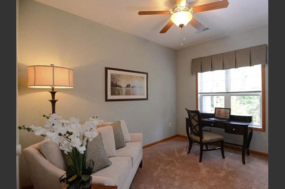 Large Living Rooms With Over Sized Windows at Highlands at Riverwalk Apartments 55+, Wisconsin 53092