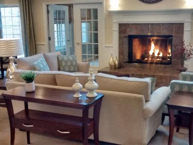 Living Rooms With Fireplace at Brookfield Highlands Apartments 55+, 20825 George Hunt Circle, 53186