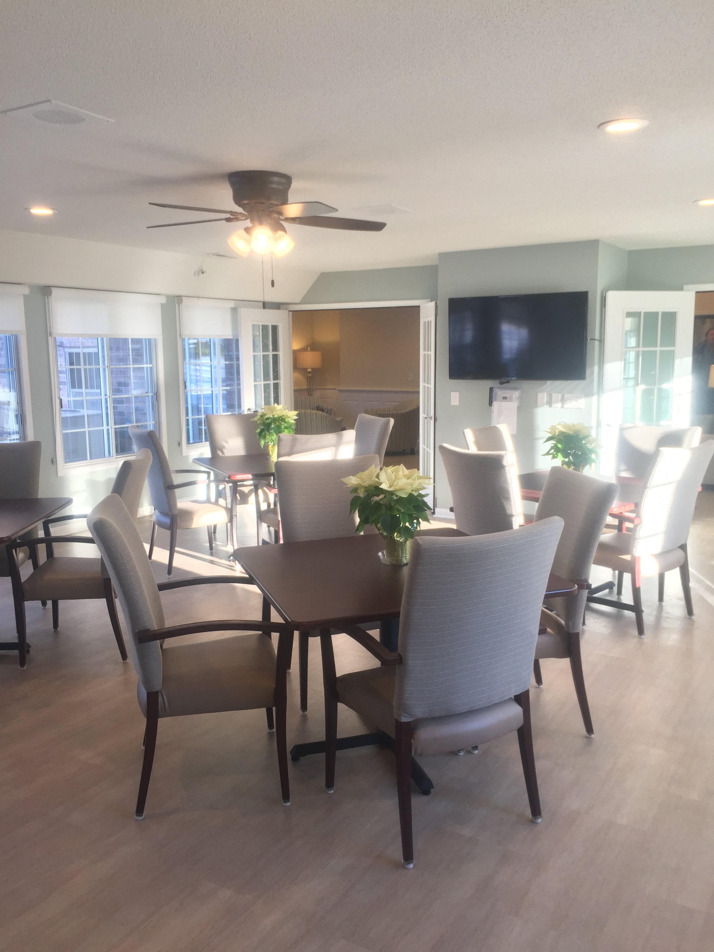 Community Room With Pleanty of Seatiing Area for Resident Events at Wildwood Highlands Apartments & Townhomes 55+, WI,53051
