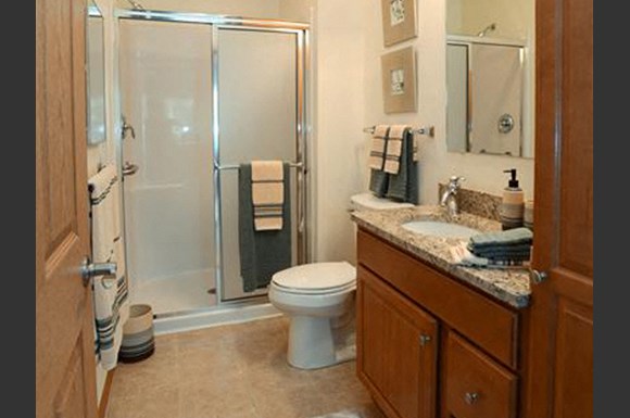 Spacious Bathrooms With Granite Style Countertops at The Highlands at Mahler Park Apartments 55+, Neenah, Wisconsin