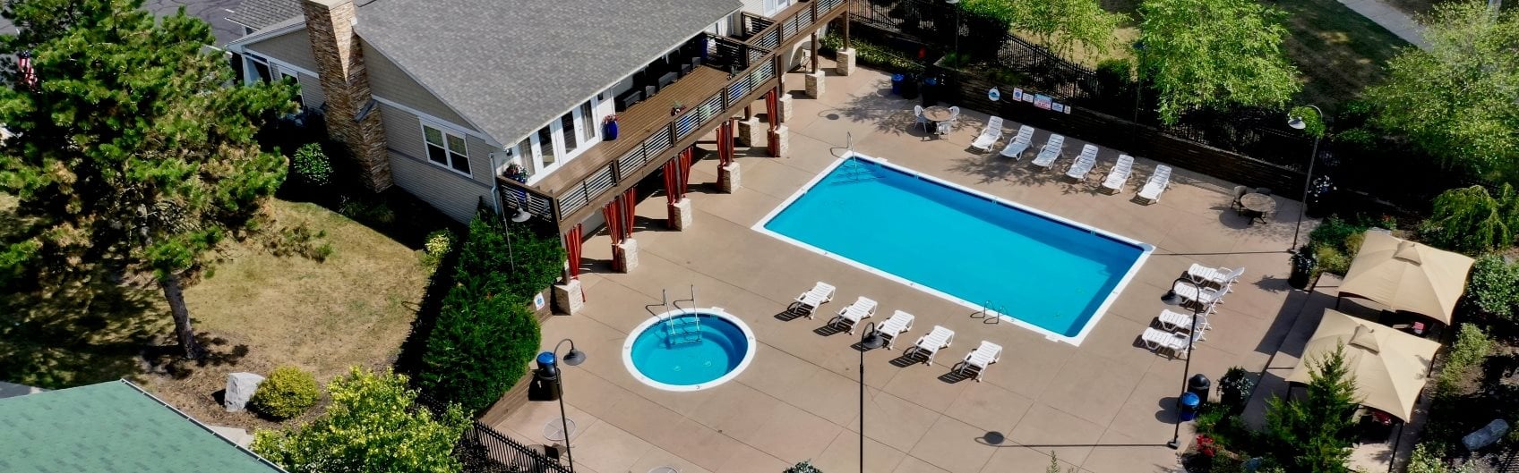 Beautiful Pool at The Bronco Club Apartments in Kalamazoo, MI