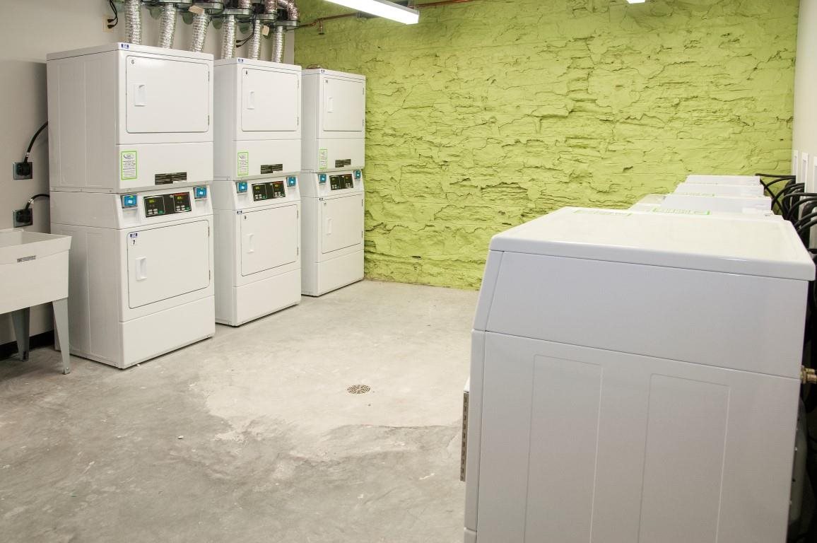Drying Machines in Laundry Room of The Cameron North Loop