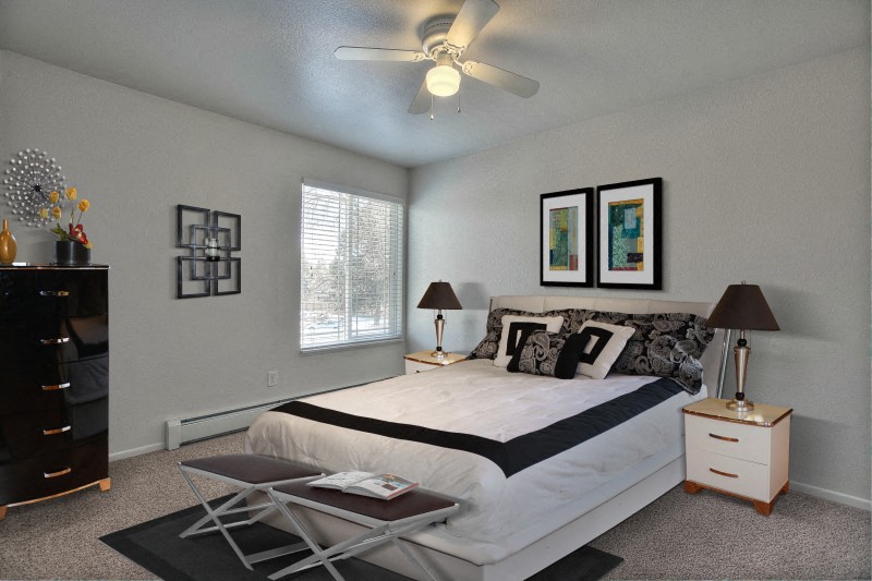Village on Stanford bedroom with window and ceiling fan