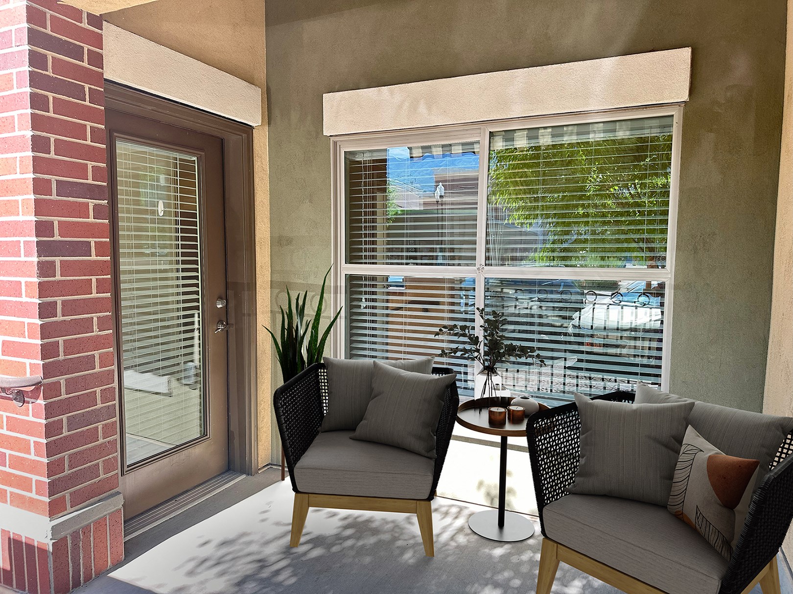 Liberty Center Apartments, Provo, Utah, Patio balcony with comfortable chairs and a table.