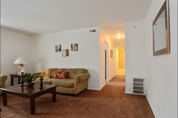 Apartments for rent at Pangea Parkwest in Indianapolis offer spacious living rooms.