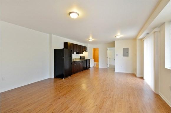 Pangea Pines Apartments feature hardwood floors and appliances in updated units.