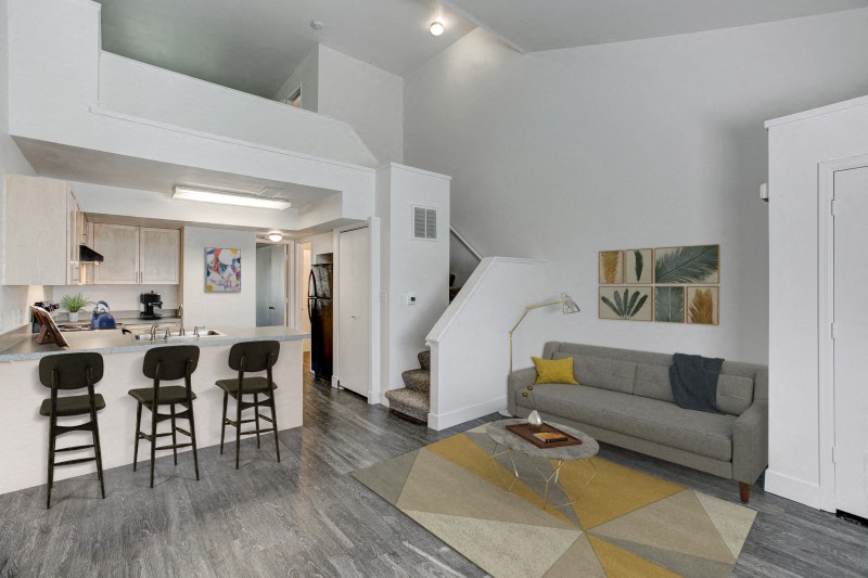 Village on Shields - Cunningham interior features large living room and bar seating in the kitchen