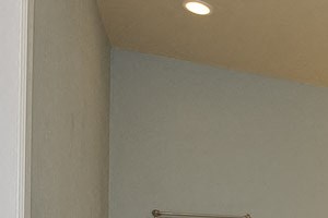 Large master bathroom with shower and spa bathtub at The Flats at Tioga Town Center