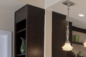 Updated kitchen with stainless steel appliances and bar stools in Newberry, FL apartment