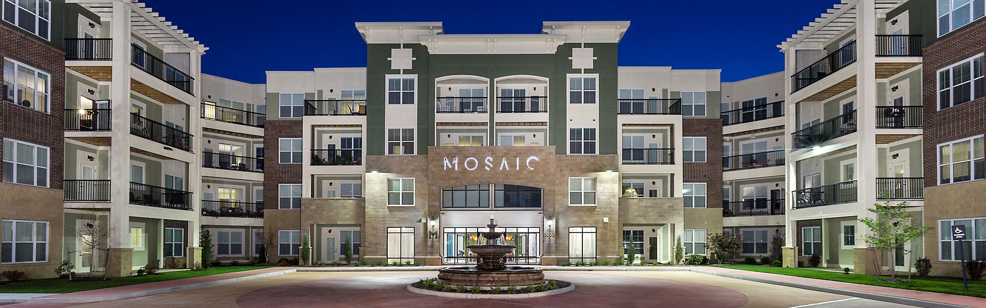 Exterior View of Mosaic at Levis Commons Apartments with fountain in Perrysburg, OH near Toledo