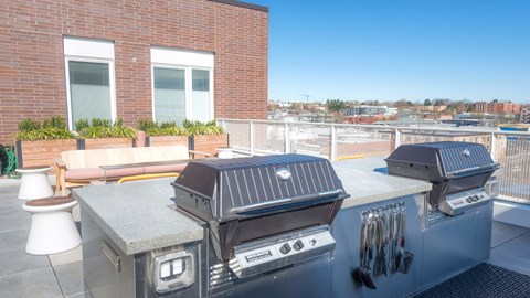 Rooftop lounge with two grills