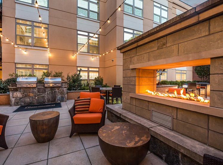 Sit next to the fireplace in Northgate's private courtyard in Virginia