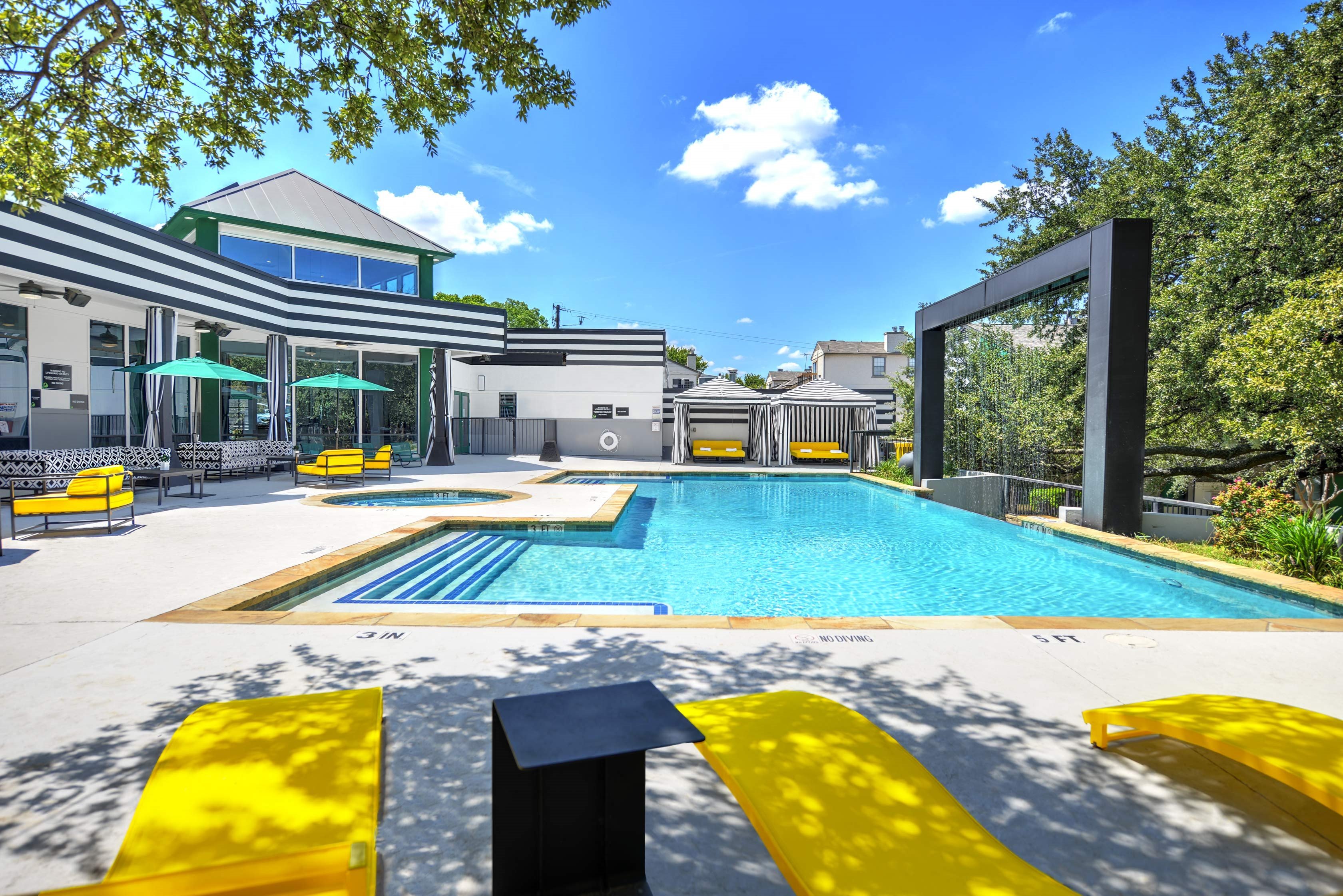 Extensive Resort Inspired Pool Deck at Clover on Park Lane, Texas