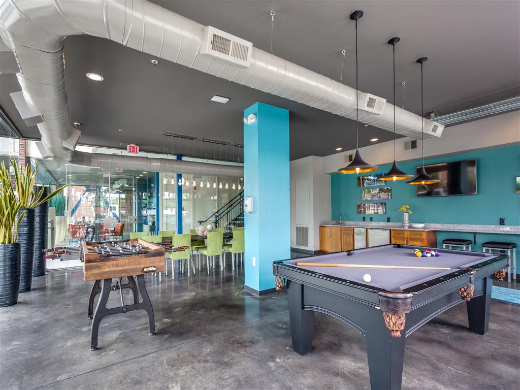 Community Room with Pool Table and Foosball at Greenway at Fisher Park, Greensboro, NC, 27401