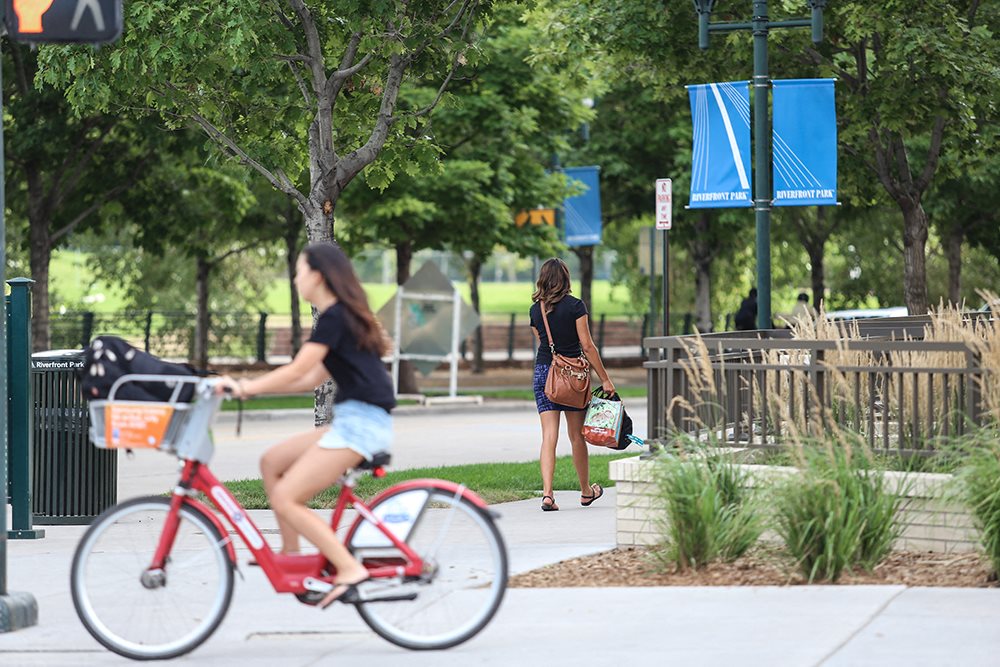 Neighborhood pathways designed for walking, biking, and recreation, surrounded by landscaped greenery.