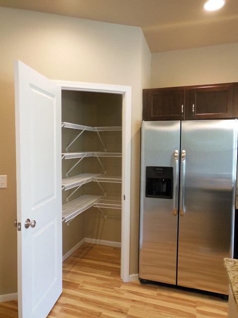 kitchen pantry, shelved, refrigerator