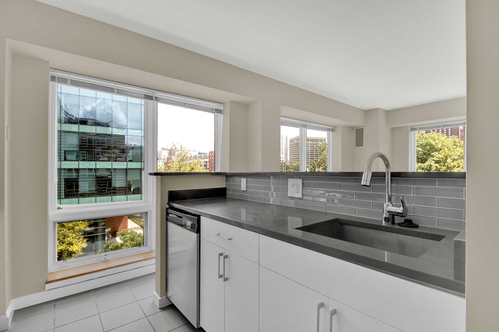 Kitchen island surrounded by windows