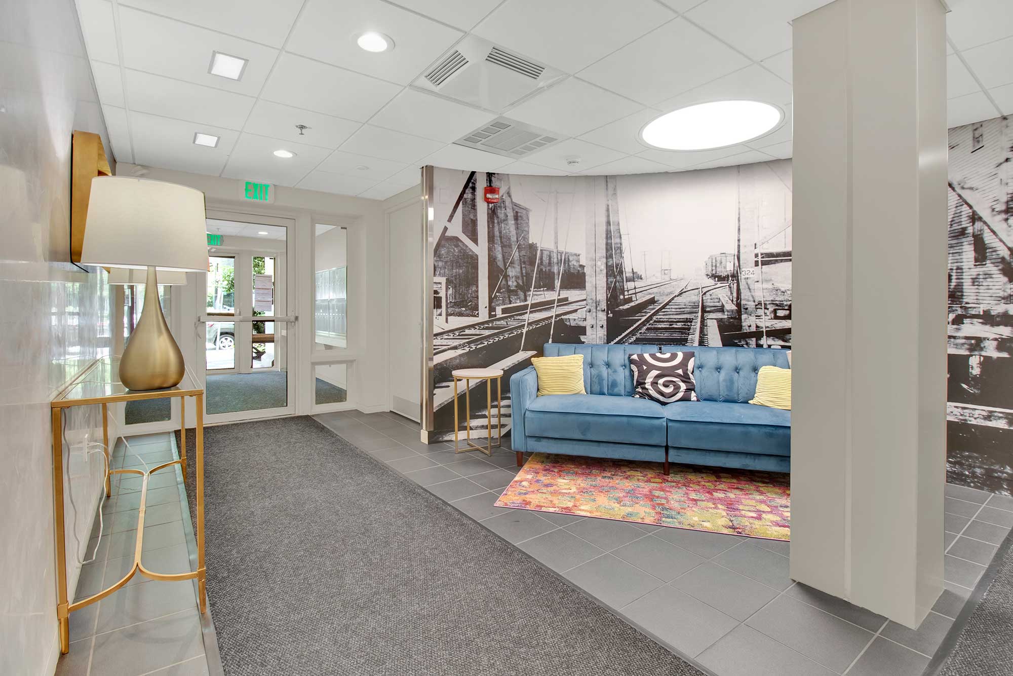 Kendall Crossing modern lobby design with photo mural