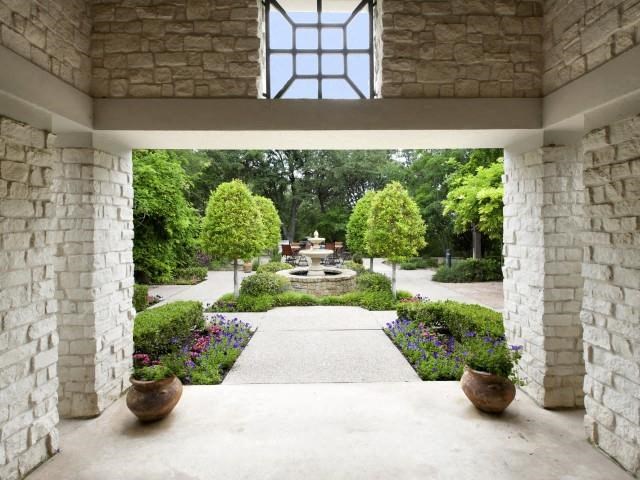 Entrance from inside community to courtyard water fountain feature