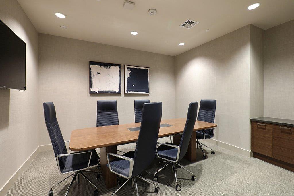 Conference room with table and chairs at Eleven 10 in Orange, CA
