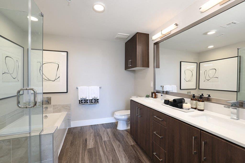 Wood-style flooring in bathroom at Eleven 10 in Orange, CA