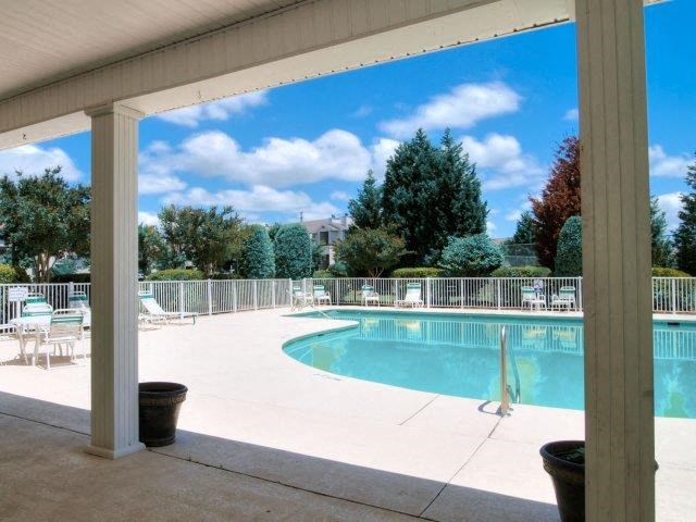 Shaded Lounge Area by Pool at Treybrooke Village Apartments, North Carolina, 27406