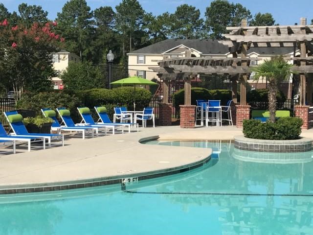 Pool Side Relaxing Area at Cobblestone Village Apartments, Summerville