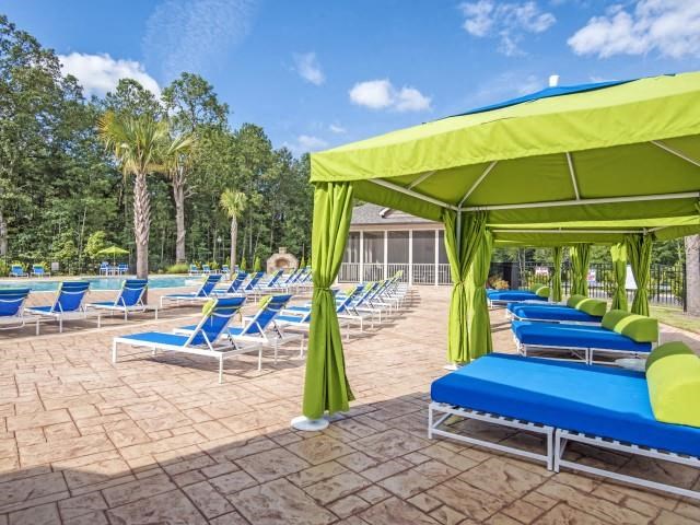 Shaded Lounge Area by Pool at Bacarra Apartments, North Carolina
