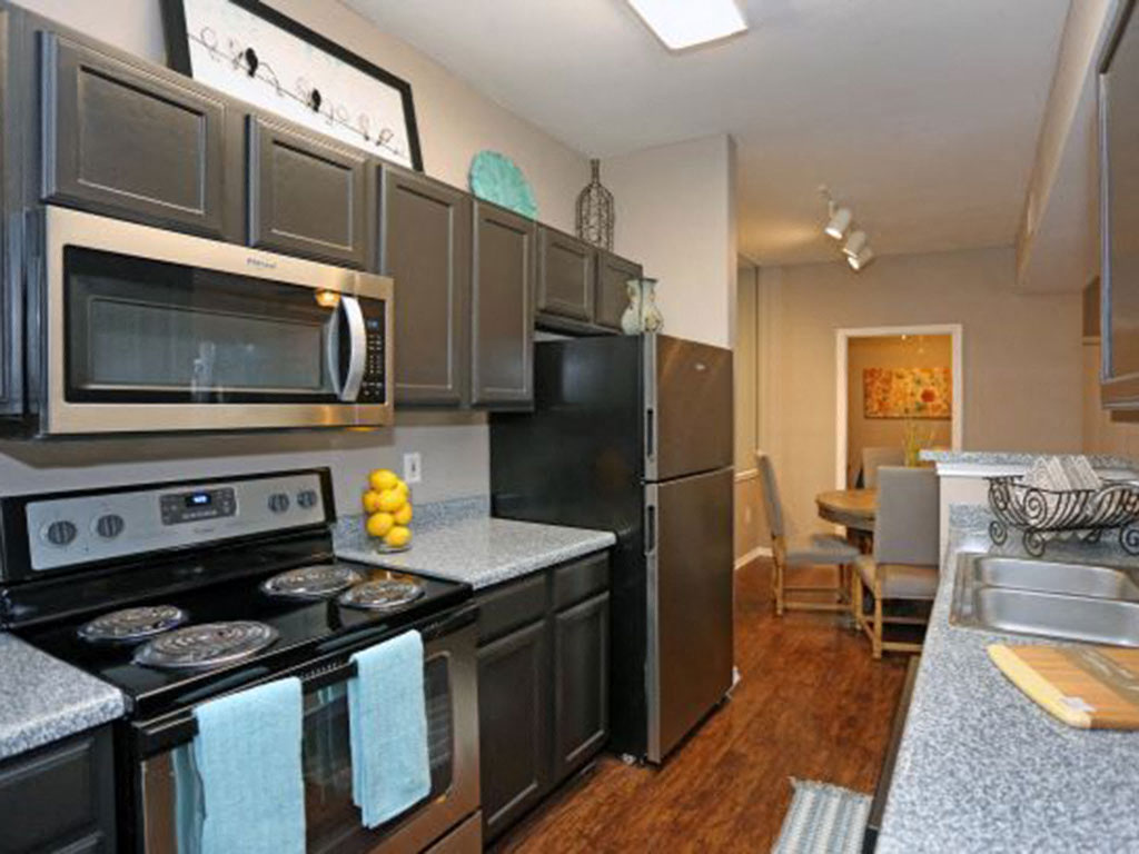 Fully-Equipped Kitchen With Stainless Steel Appliances at Bardin Greene Apartments in Arlington, Texas