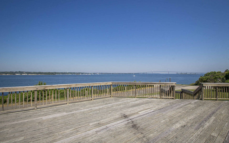 a view of the water from the deck of a home