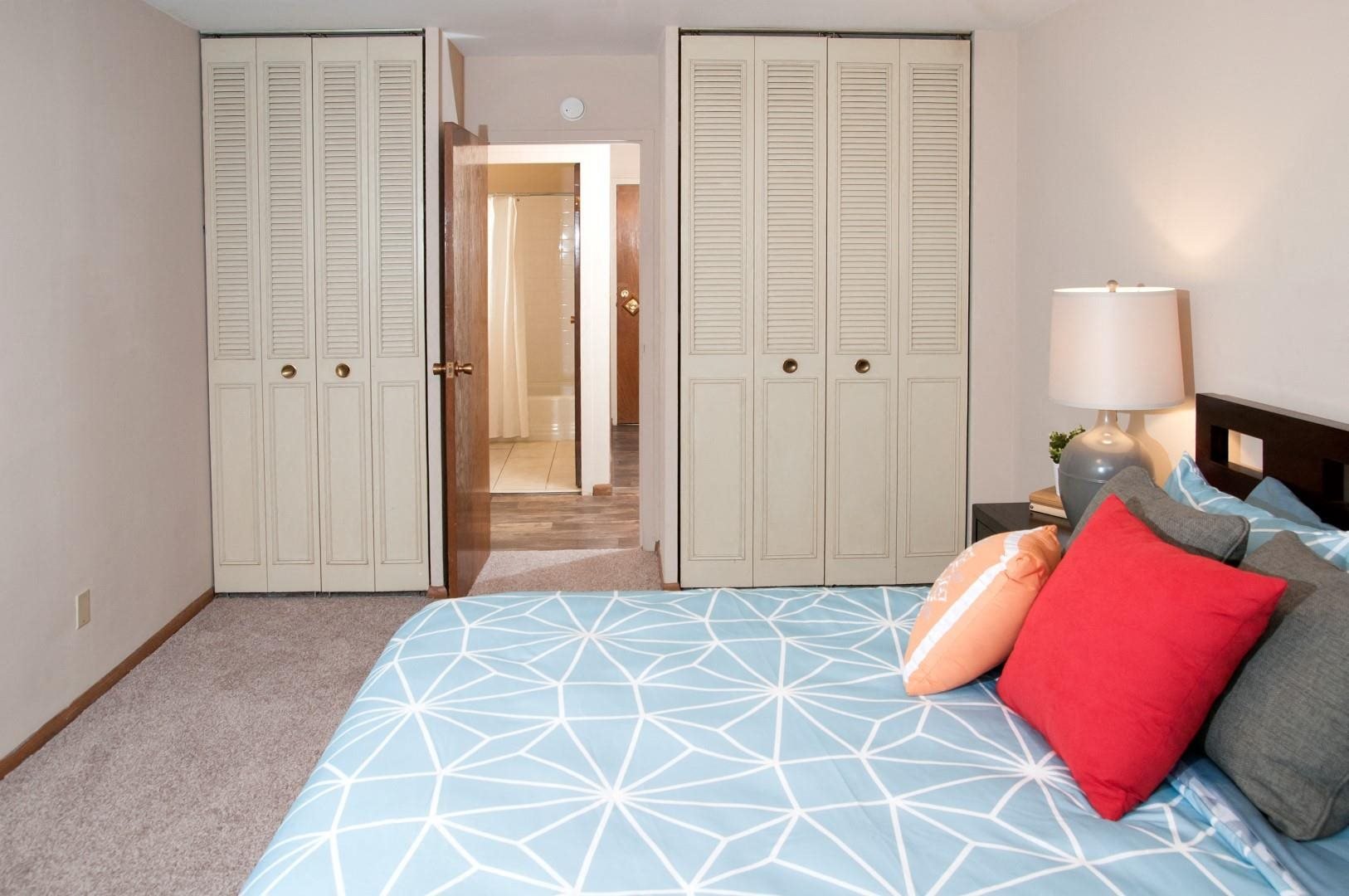 Two Double Door Closets in Master Bedroom of Boulevard 100 Apartments in St. Louis Park, MN