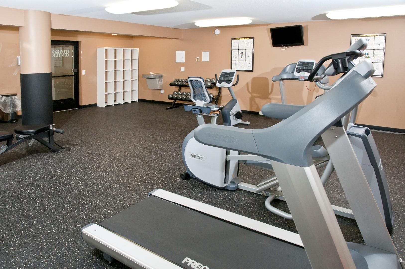 Fitness Room of St. Louis Park Apartment With Cardio Equipment and Free Weights