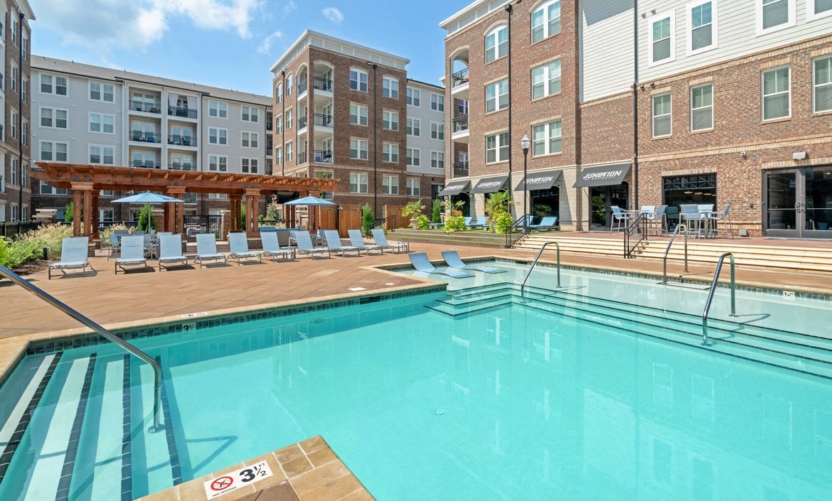 Cornelius, NC Apartments for Rent - The Junction at Antiquity Outdoor Pool With Lounge Chairs