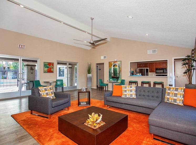 Spacious and Vibrant Clubhouse with Comfortable Seating Areas and Kitchen