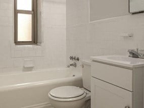 Apartment Bathrooms With Tubs At Macomb Gardens Apartments In Washington D.C.
