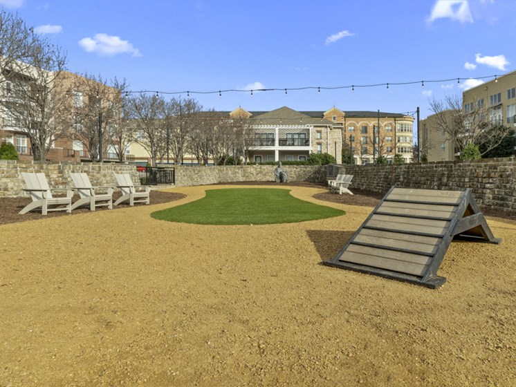 Apartments in The Colony for Rent - Flatiron District at Austin Ranch Expansive Enclosed Dog Run with Seating Areas